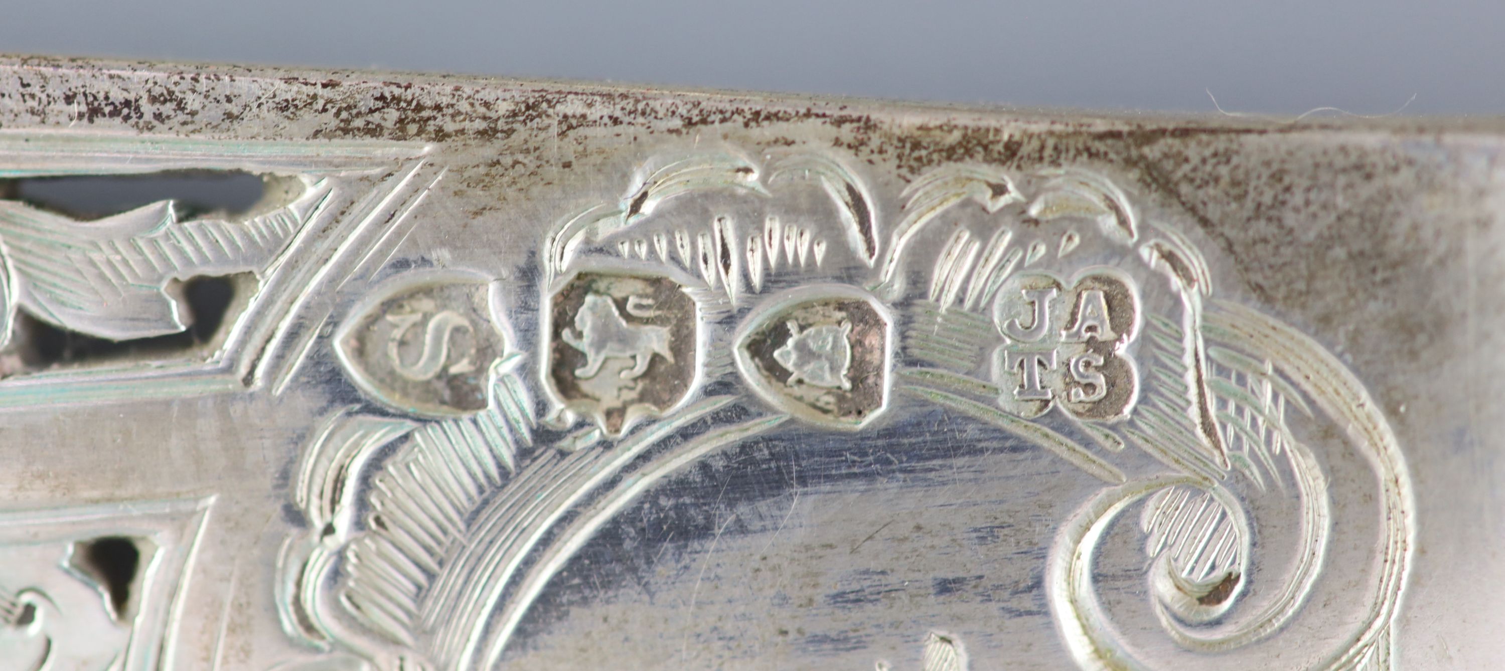 A cased ornate pair of Victorian silver fish servers, Aldwinckle & Slater